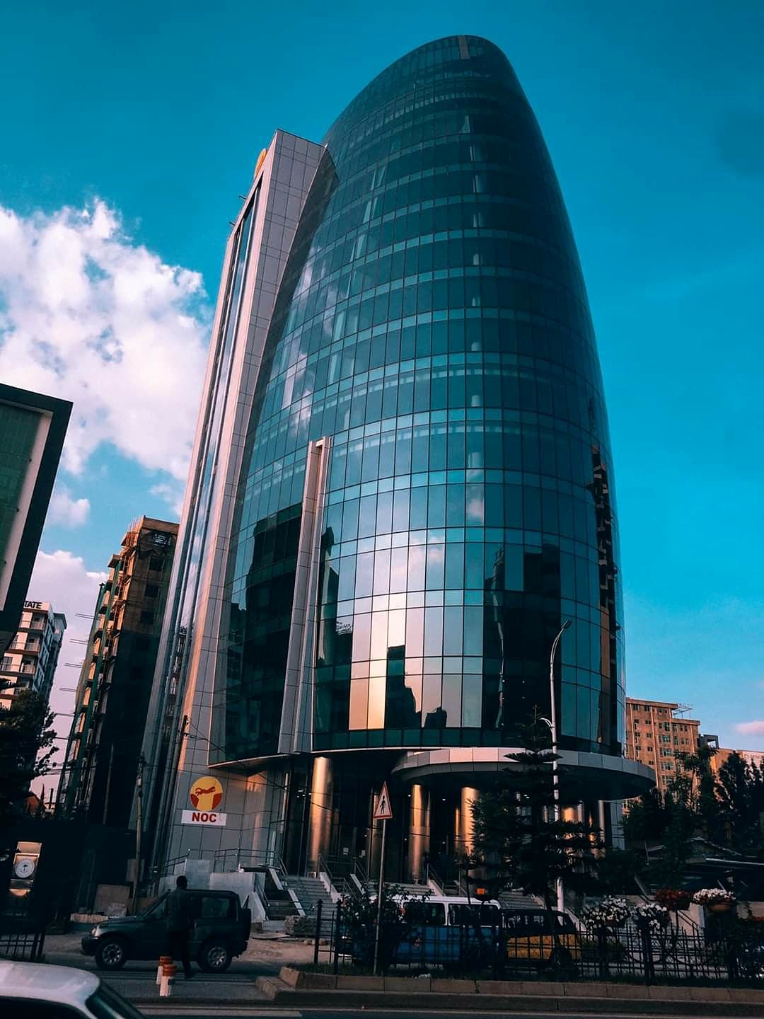A modern glass office tower in Nairobi
